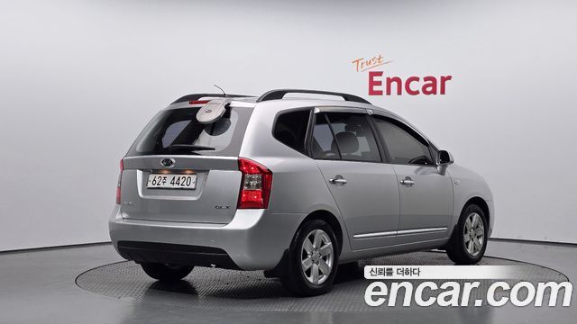 Kia Carens 2009 — photo 2