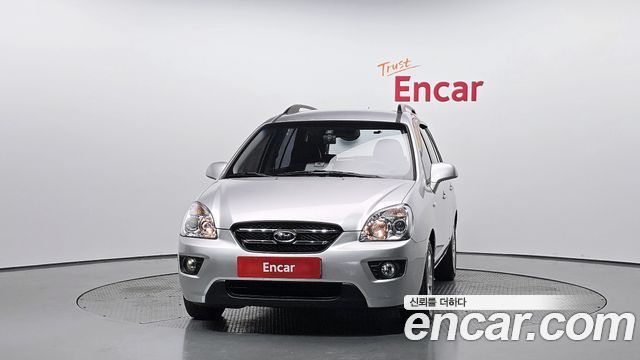 Kia Carens 2009 — photo 3