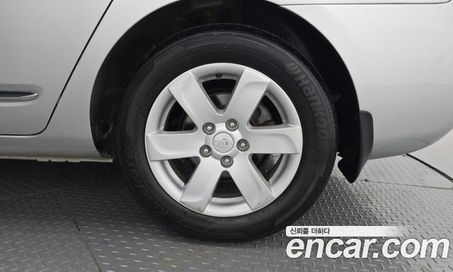 Kia Carens 2009 — photo 5