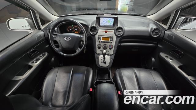 Kia Carens 2009 — photo 10