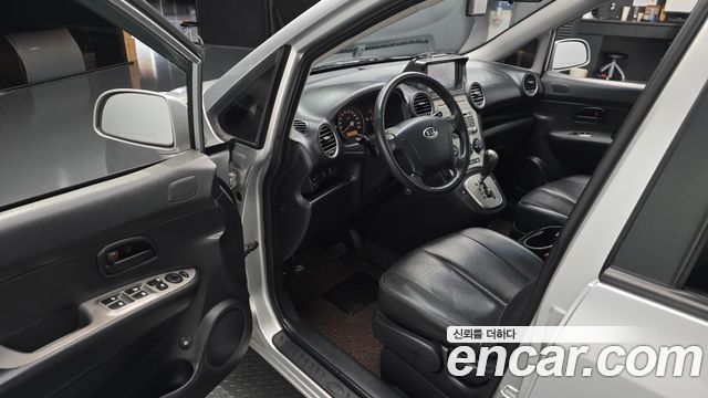 Kia Carens 2009 — photo 13