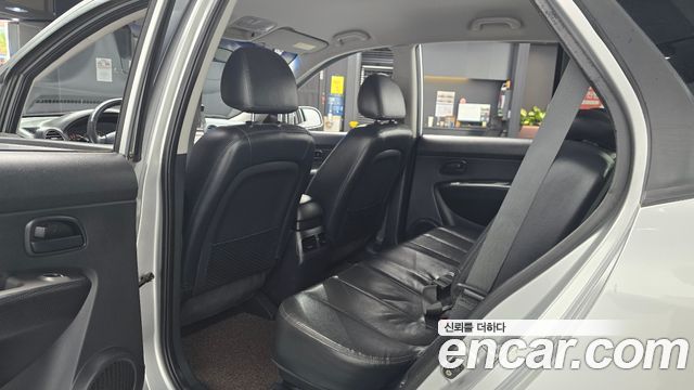 Kia Carens 2009 — photo 17