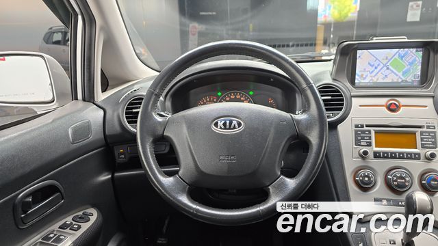 Kia Carens 2009 — photo 18