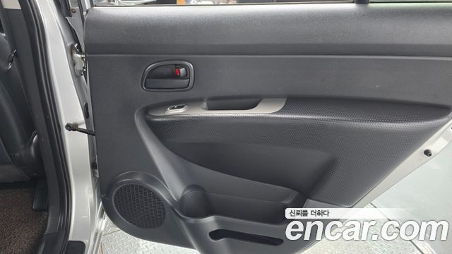 Kia Carens 2009 — photo 15