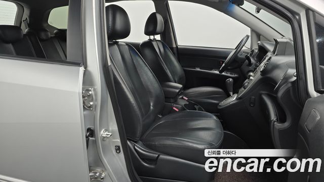 Kia Carens 2009 — photo 16