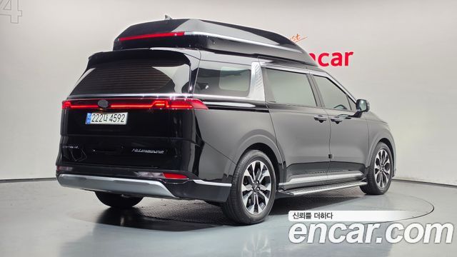 Kia Canival 2021 — photo 2
