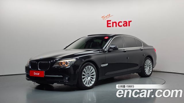BMW 7-Series 2012 — photo 1
