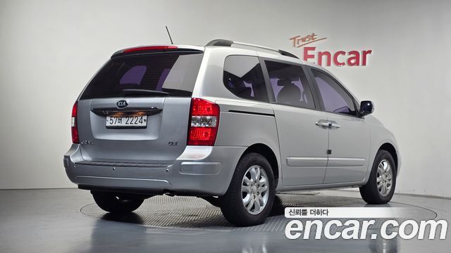 Kia Canival 2013 — photo 2