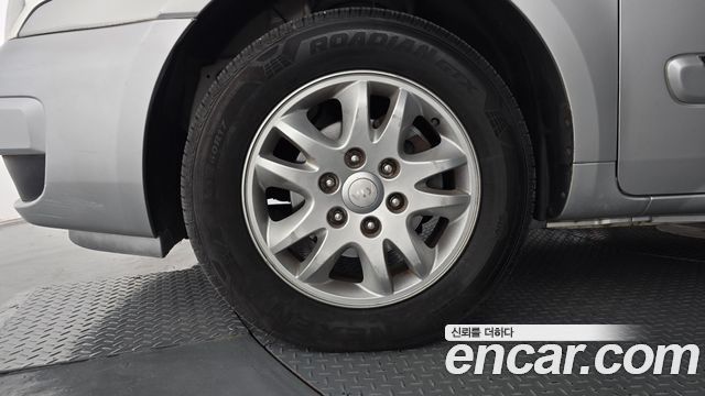 Kia Canival 2013 — photo 5
