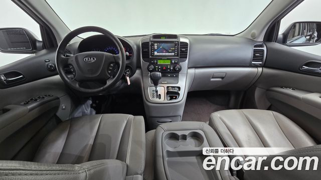 Kia Canival 2013 — photo 10
