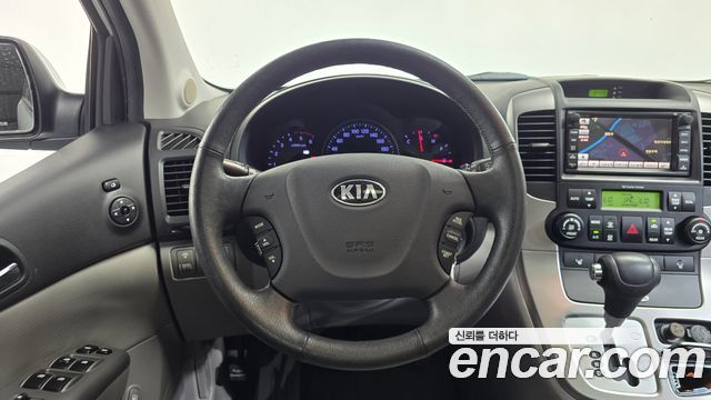 Kia Canival 2013 — photo 18