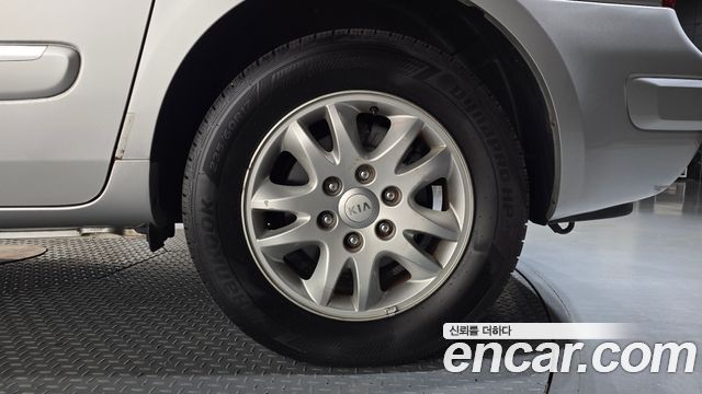 Kia Canival 2013 — photo 7