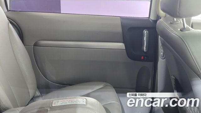 Kia Canival 2013 — photo 15