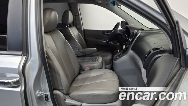 Kia Canival 2013 — photo 16