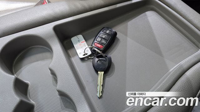 Kia Canival 2013 — photo 28