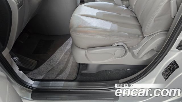 Kia Canival 2013 — photo 32