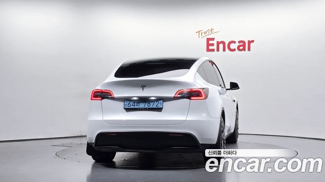 Tesla Model Y 2024 — photo 4