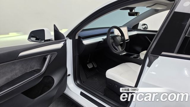 Tesla Model Y 2024 — photo 13