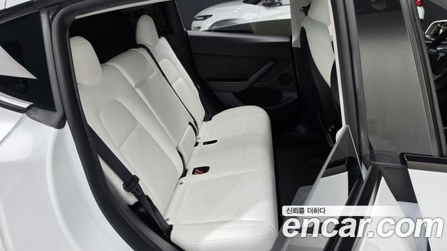 Tesla Model Y 2024 — photo 18