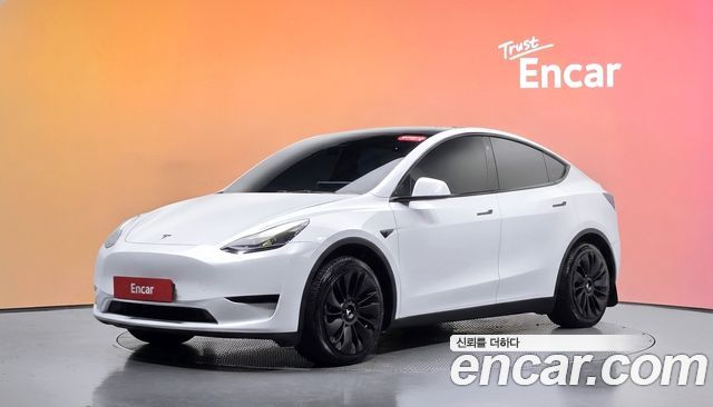 Tesla Model Y 2024 — photo 1