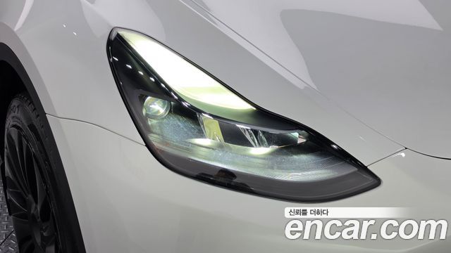 Tesla Model Y 2024 — photo 8