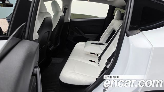 Tesla Model Y 2024 — photo 16