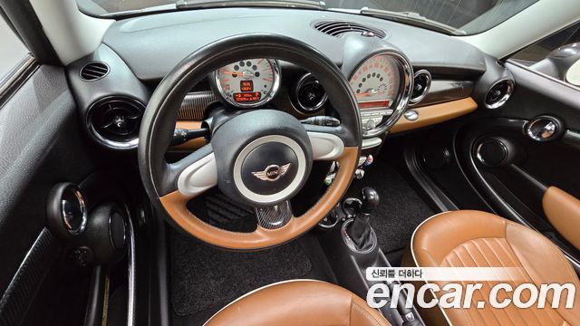 Mini Cooper 2010 — photo 7
