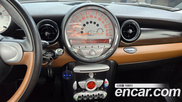 Mini Cooper 2010 — photo 13