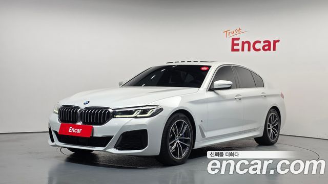 BMW 5-Series 2021 — photo 1