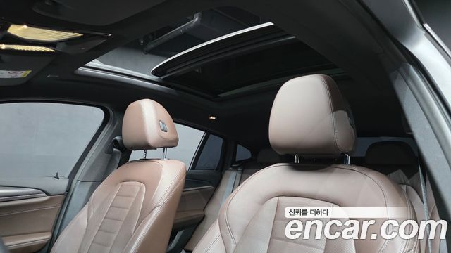 BMW X4 2023 — photo 25