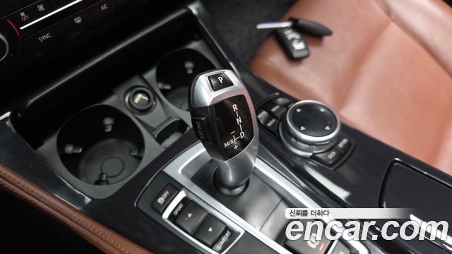 BMW 5-Series 2014 — photo 9