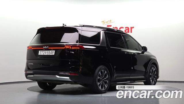 Kia Canival 2023 — photo 2