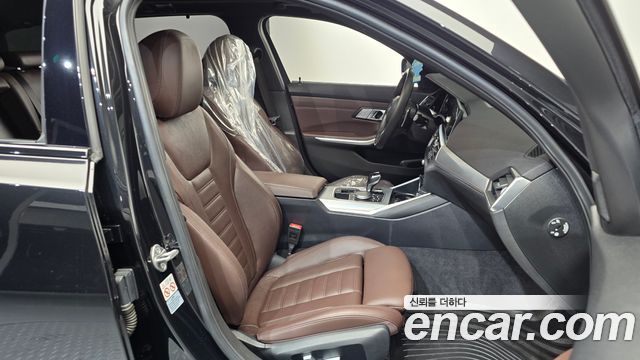 BMW 3-Series 2022 — photo 16