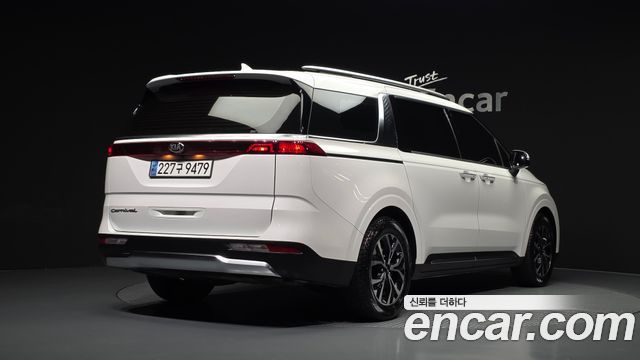 Kia Canival 2021 — photo 2
