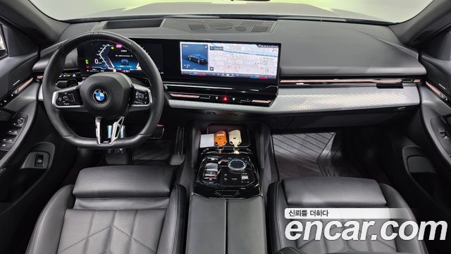 BMW 5-Series 2024 — photo 10