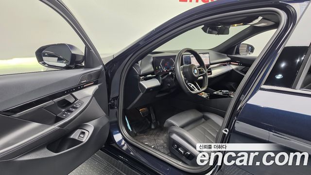 BMW 5-Series 2024 — photo 13
