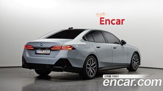 BMW 5-Series 2024 — photo 2