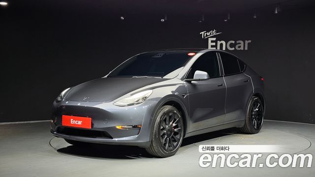 Tesla Model Y 2021 — photo 1