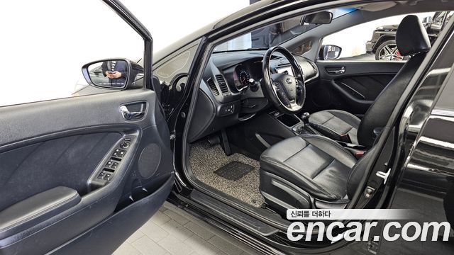 Kia K3 2013 — photo 13