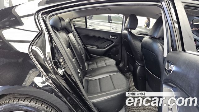 Kia K3 2013 — photo 18