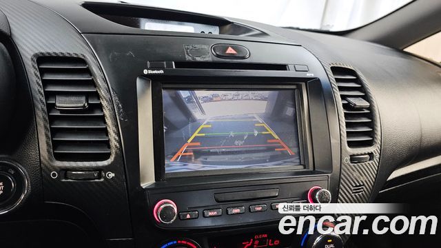 Kia K3 2013 — photo 21