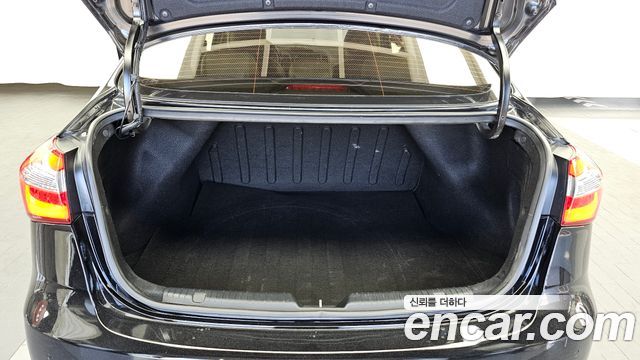 Kia K3 2013 — photo 26