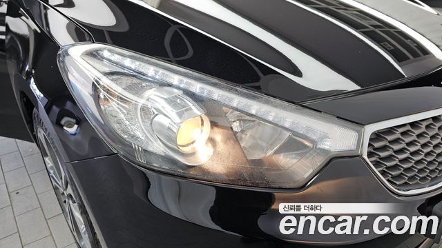 Kia K3 2013 — photo 8