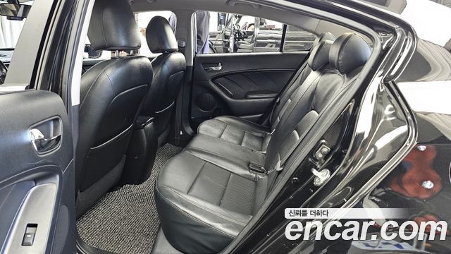 Kia K3 2013 — photo 16