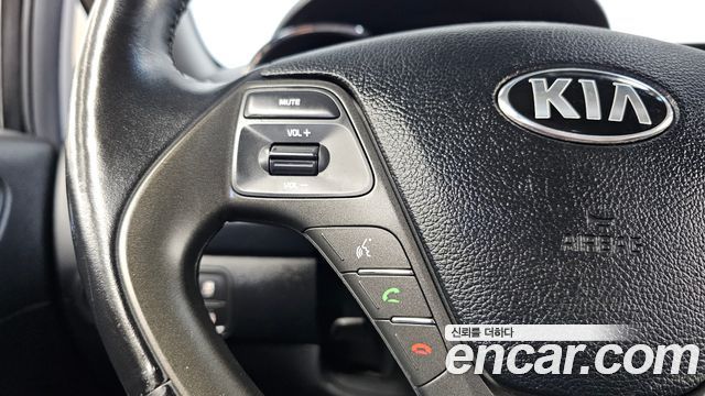 Kia K3 2013 — photo 27