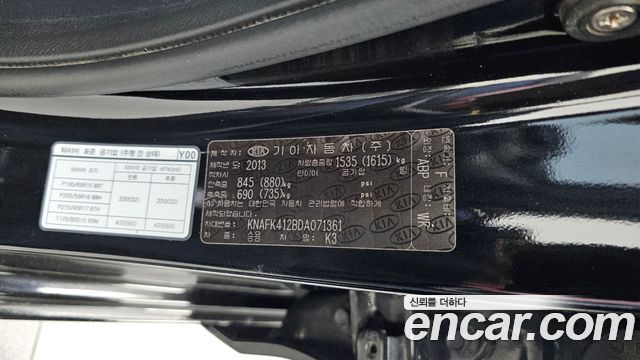 Kia K3 2013 — photo 29