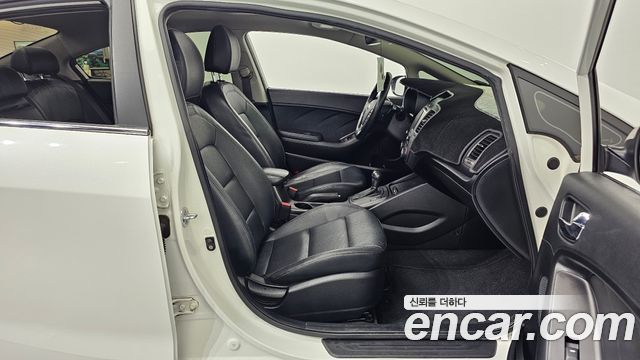 Kia K3 2013 — photo 17