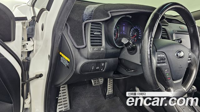 Kia K3 2013 — photo 23