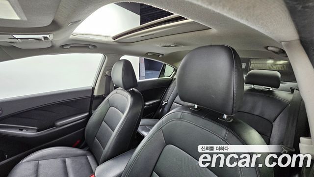 Kia K3 2013 — photo 25