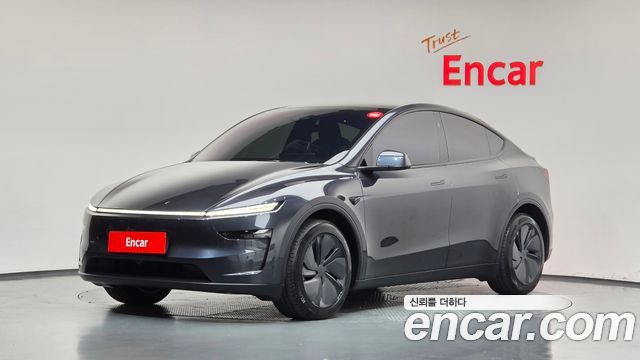 Tesla Model Y 2025 — photo 1